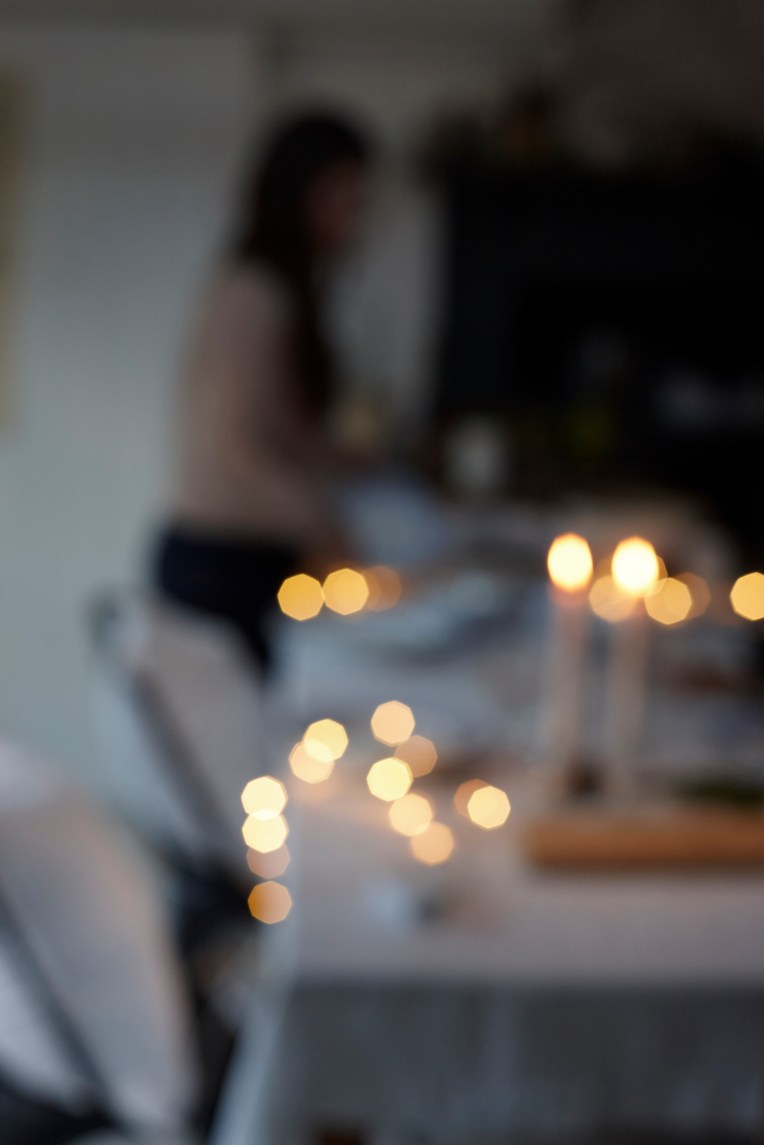 festive atmospheric dining table created by interiors photographer and still life photographer joanna henderson