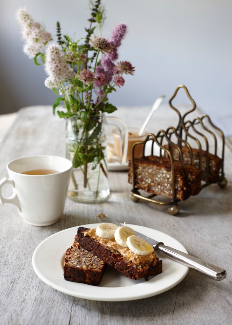 Freshly baked loaf topped with banana and peanut butter. Food photography by Joanna Henderson