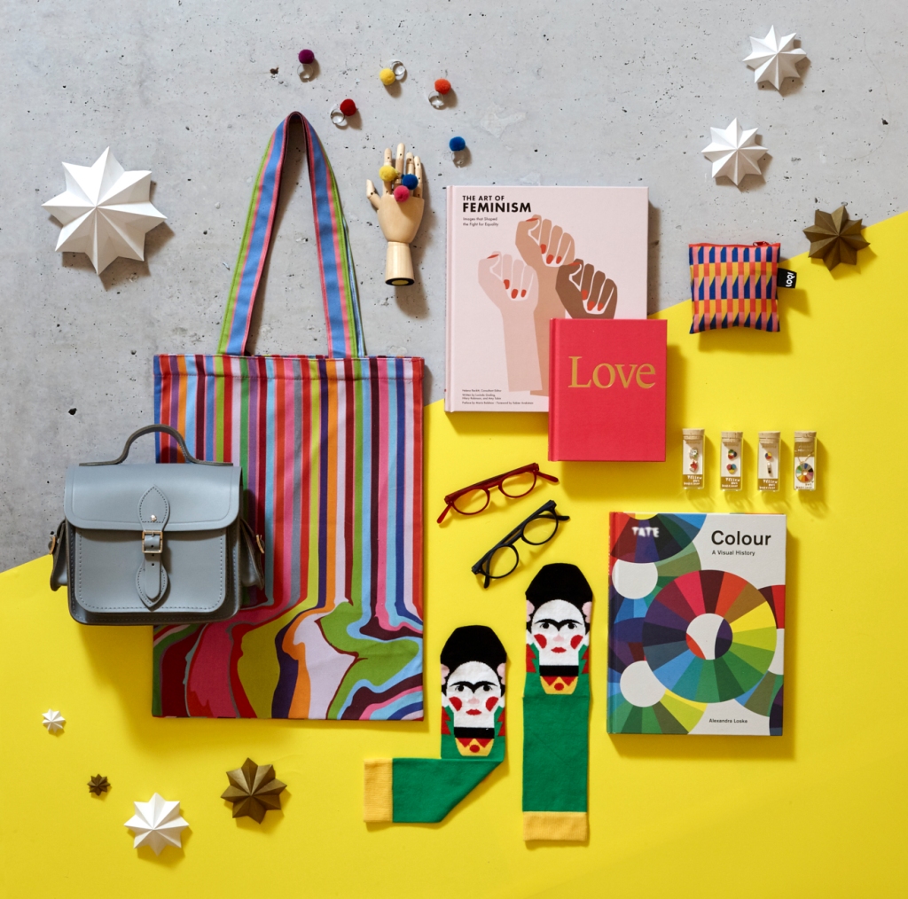 Christmas gifts from the Tate shop. A greay leather satchel, tote bag, glasses, Frida Khalo socks and pom pom rings.